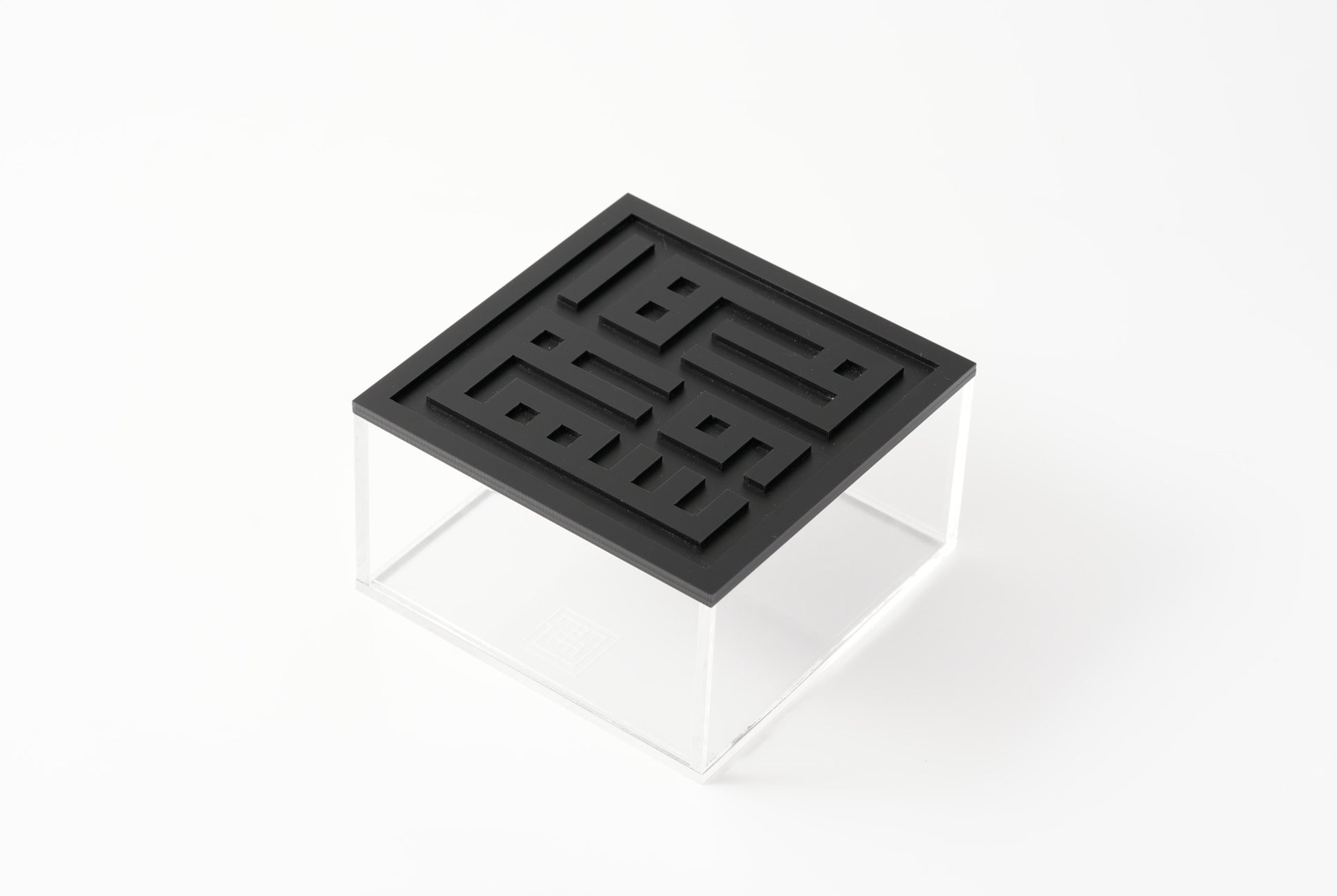 Acrylic box carrying the Arabic phrase Ahlan wa Sahlan in calligraphy, by MASHQ Dubai