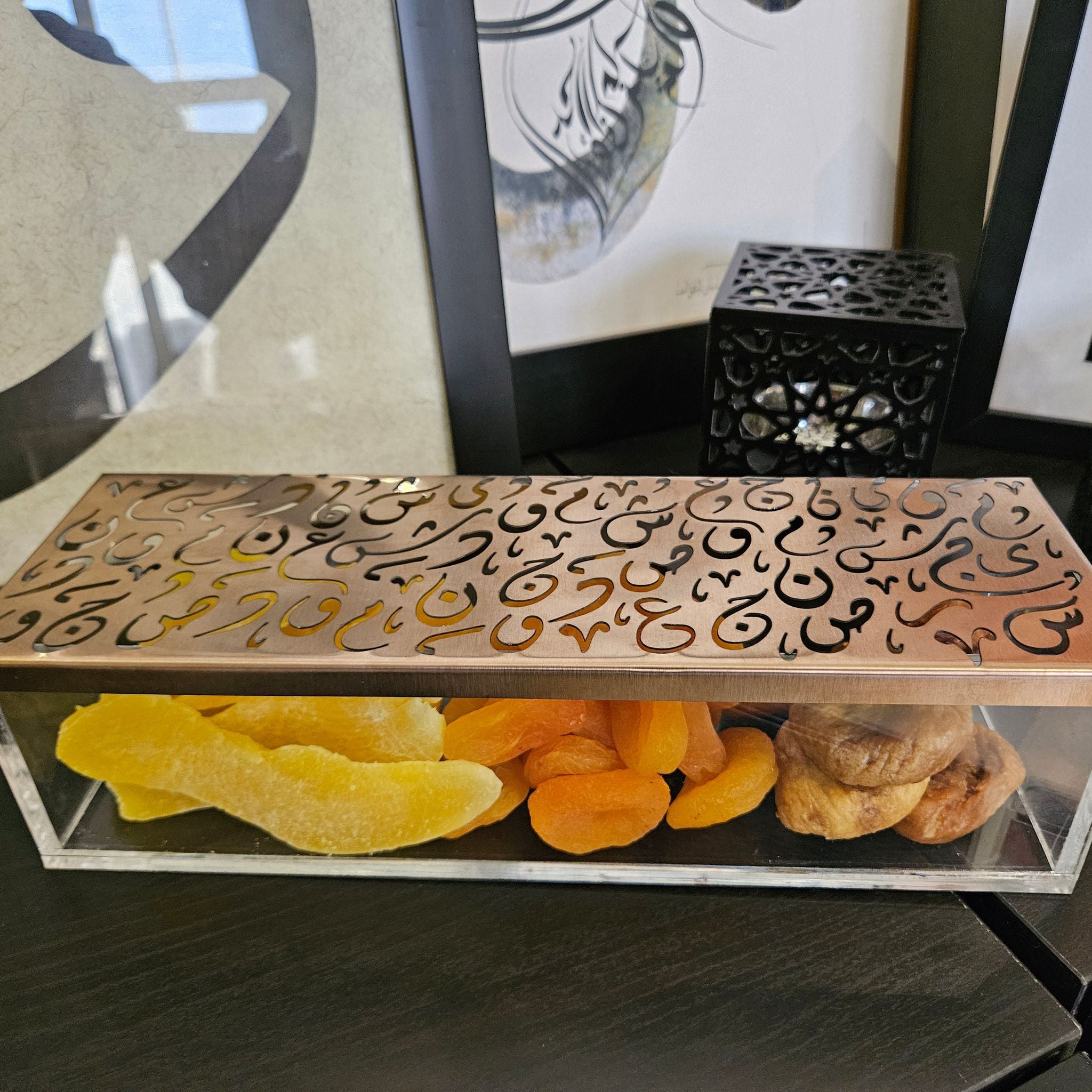 Acrylic dry fruits box engraved with Diwani Arabic calligraphy by MASHQ Dubai