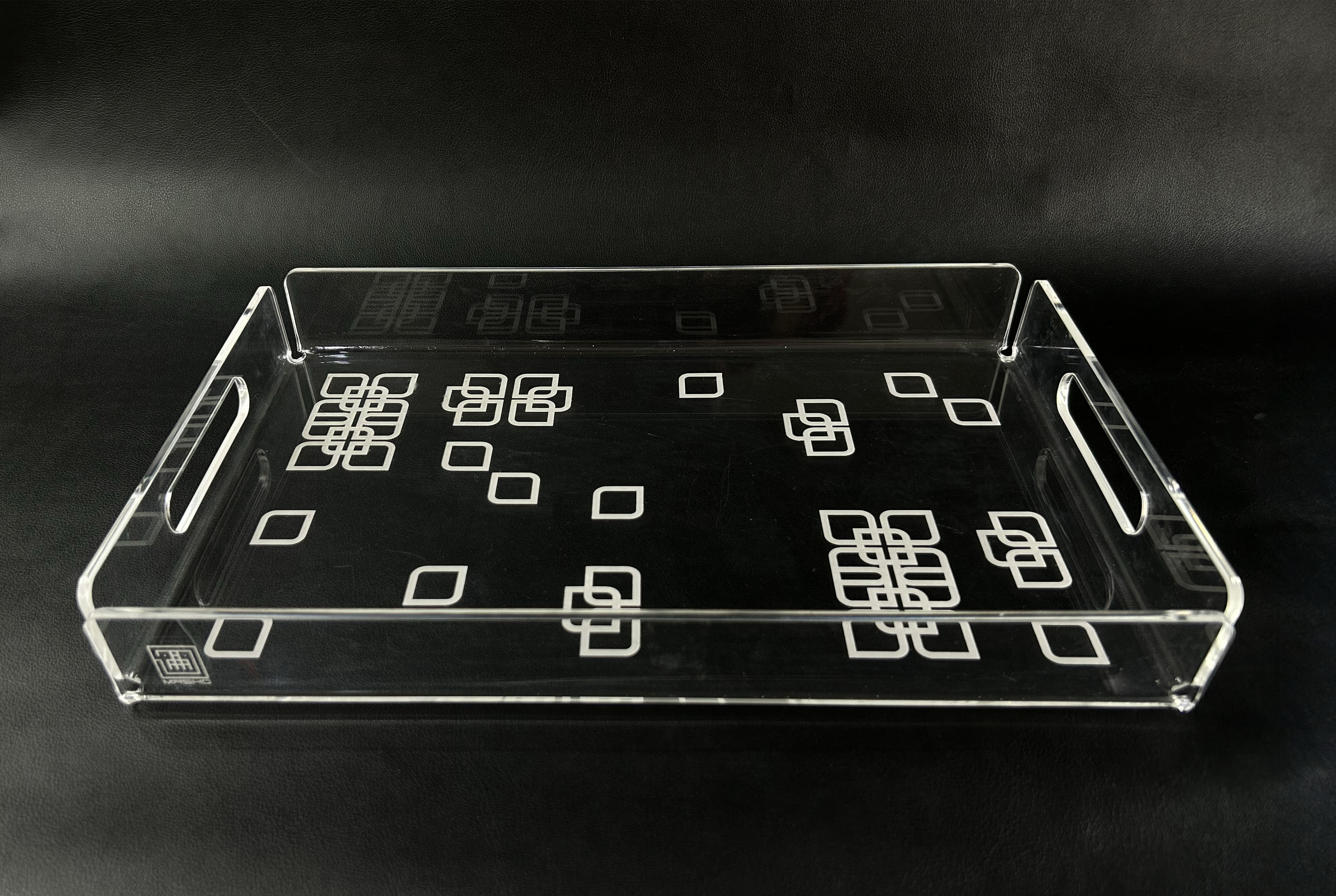 Clear acrylic serving tray engraved with arabesque flower design by MASHQ Dubai