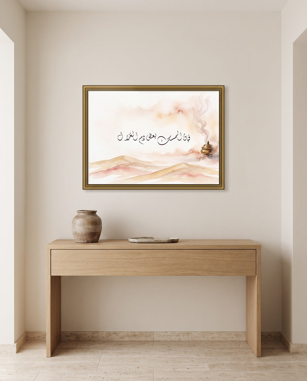 Musk Is Part of the Gazelle’s Blood: Arabic poetry in Diwani calligraphy, framed in polished gold above an oak console in an entrance hall