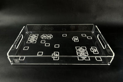 Clear acrylic serving tray engraved with arabesque flower design, made in the UAE by MASHQ