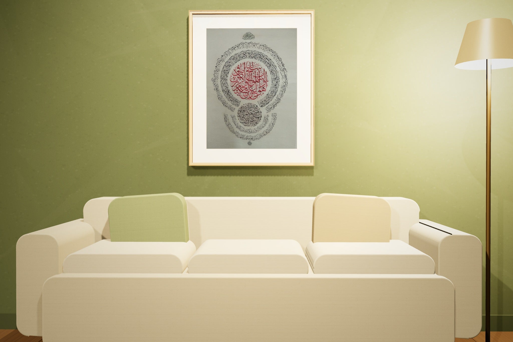 «سبح لله ما في السماوات والأرض» framed — natural oak frame, in an olive lounge